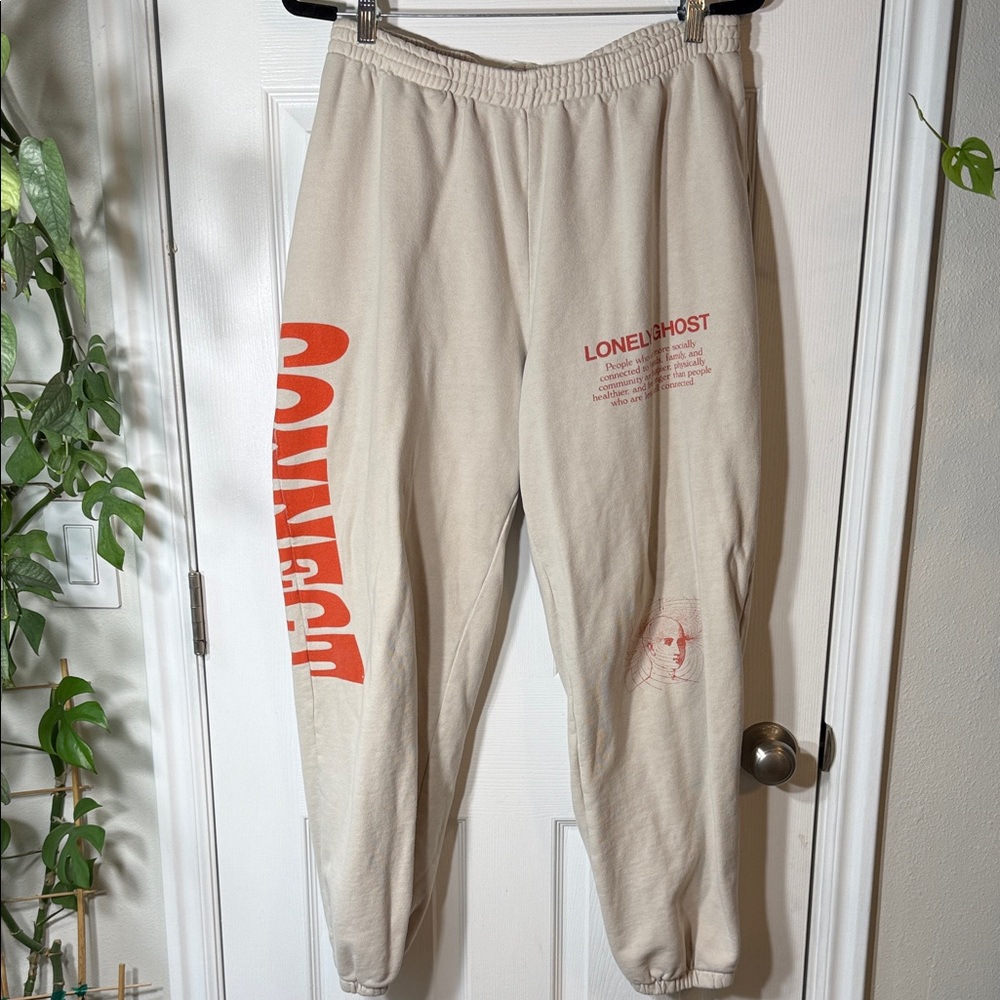 LONELY GHOST unisex Cream Joggers with orange Accents